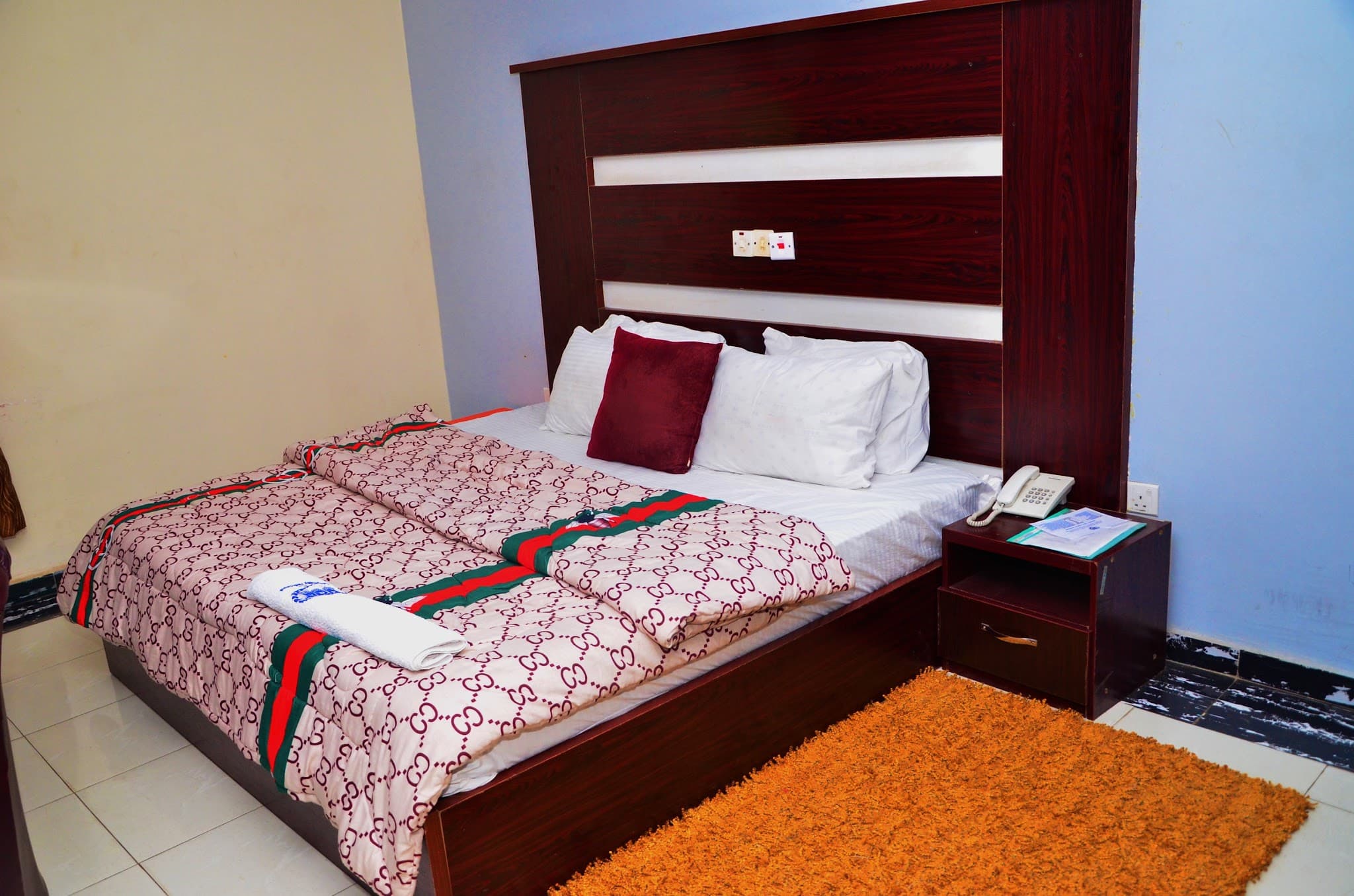 Guest room interior at Akiavic Blue Roof Hotel